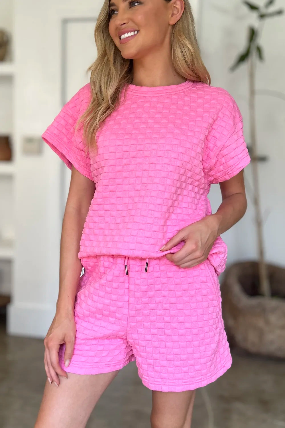 Pink double take full-size textured T-shirt and shorts set by Trendsi, casual and comfortable for everyday wear