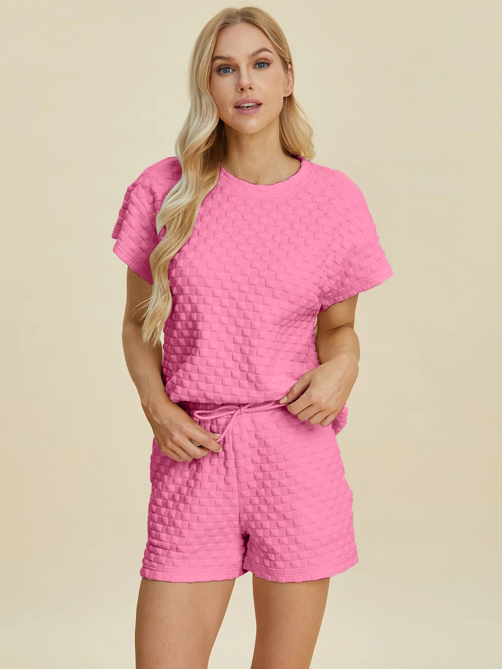 Pink double take full size texture T-shirt and shorts set by Trendsi, casual loungewear with a textured fabric design.