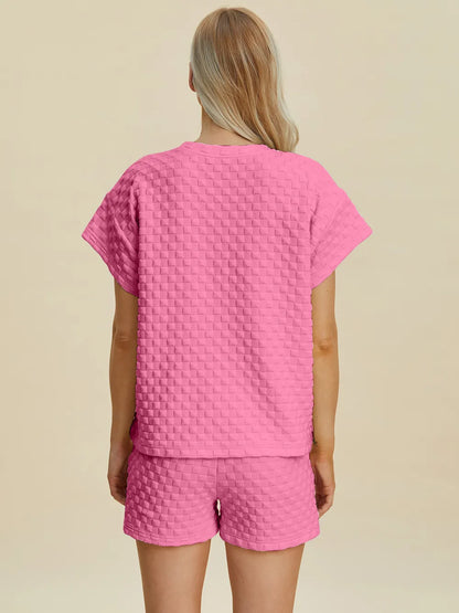 Pink double take full size textured T-shirt and shorts set by Trendsi, casual loungewear with a relaxed fit and comfortable fabric.