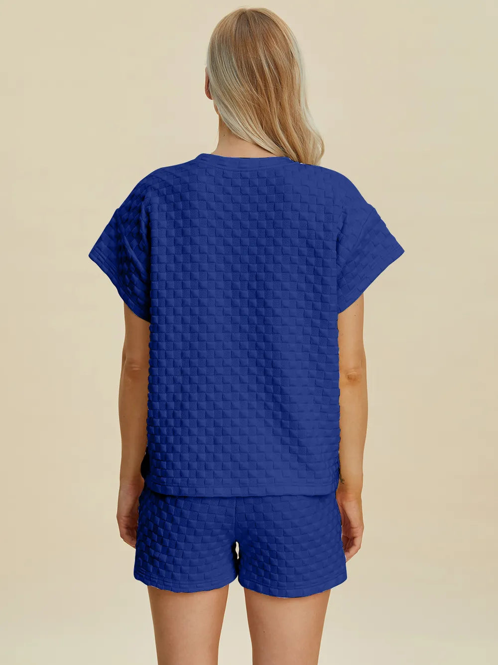 Pink double take full-size texture T-shirt and shorts set by Trendsi, casual loungewear with stylish fabric details.