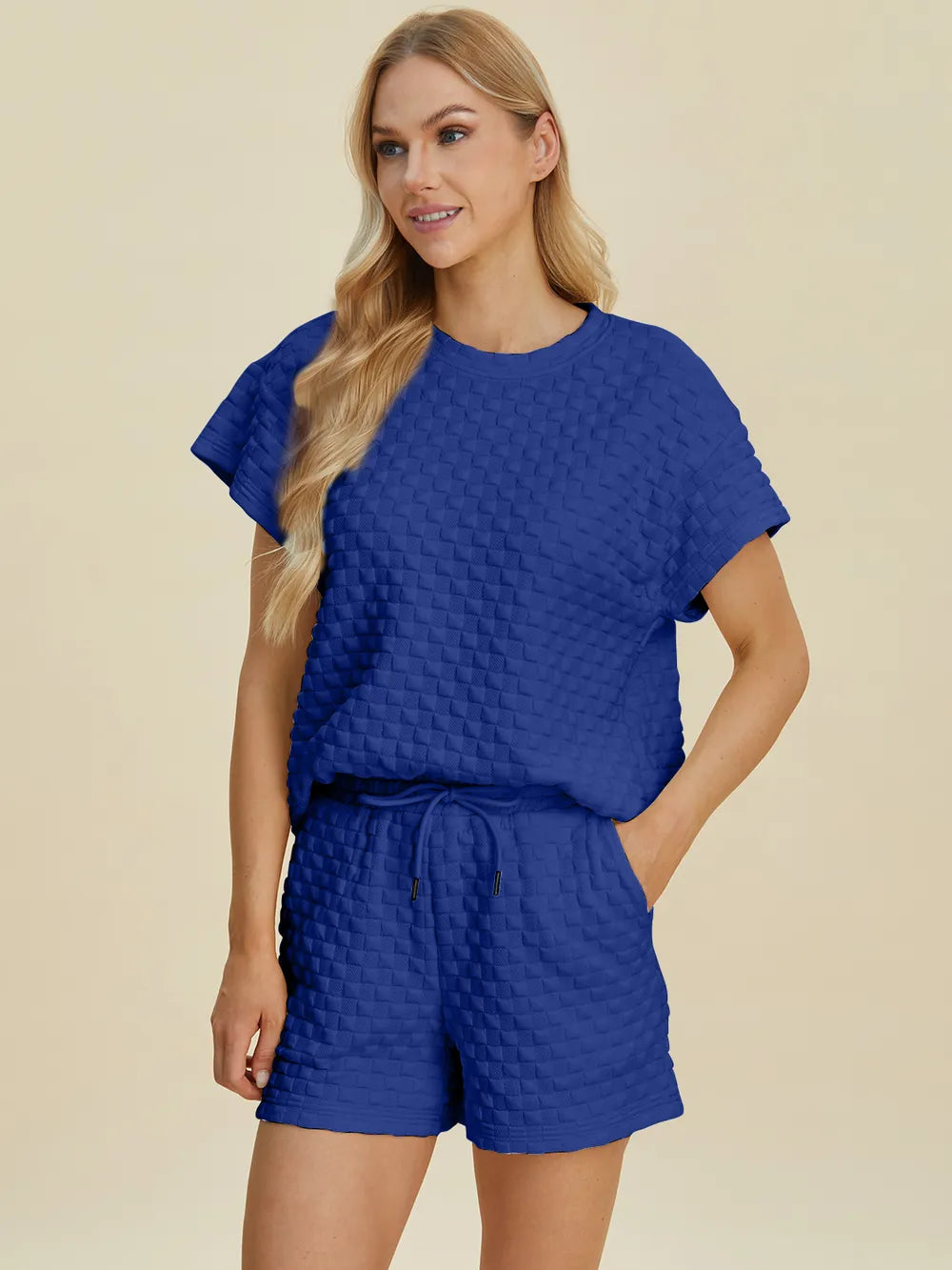 Pink double take full size texture t-shirt and shorts set by Trendsi, casual matching outfit with textured fabric details.