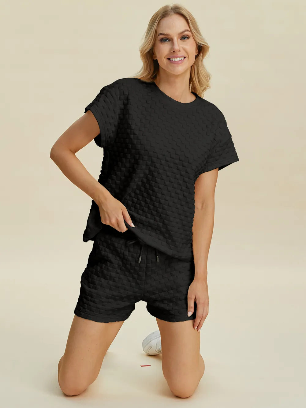 Pink Trendsi Double Take full-size texture T-shirt and shorts set, featuring a stylish casual look with textured fabric.