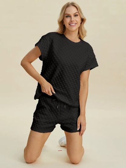 Pink Trendsi Double Take full-size texture T-shirt and shorts set, featuring a stylish casual look with textured fabric.