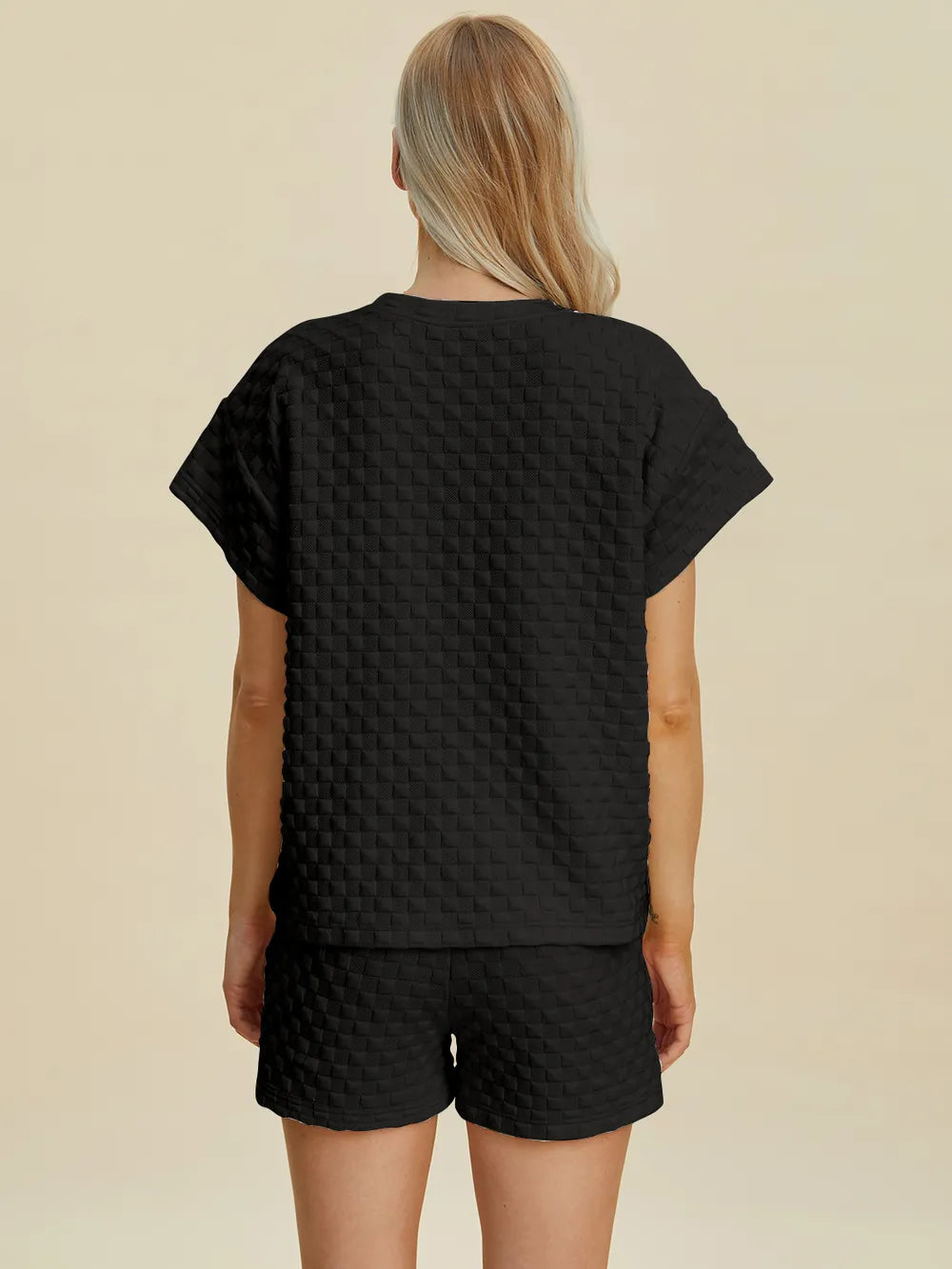 Pink double take full-size texture T-shirt and shorts set by Trendsi, casual outfit with a textured fabric design.