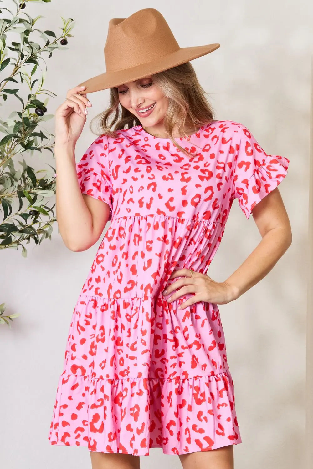 Pink double take short flounce sleeve tiered dress by Trendsi, featuring layered tiers and a flouncy sleeve design.