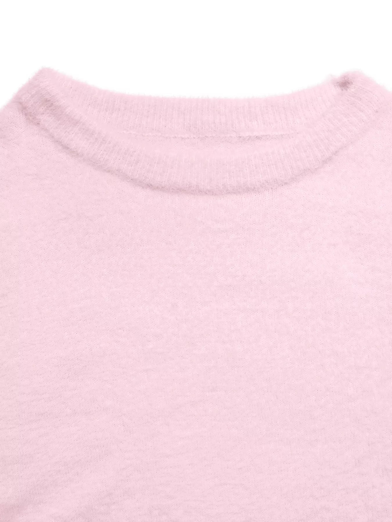 Pink fluffy long sleeve sweater from Trendsi, cozy knit with a soft, plush texture, featuring a relaxed fit and ribbed cuffs.