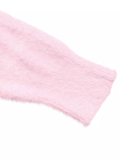 Pink fluffy long sleeve sweater by Trendsi, cozy knit top with a soft, plush texture and relaxed fit for casual wear.