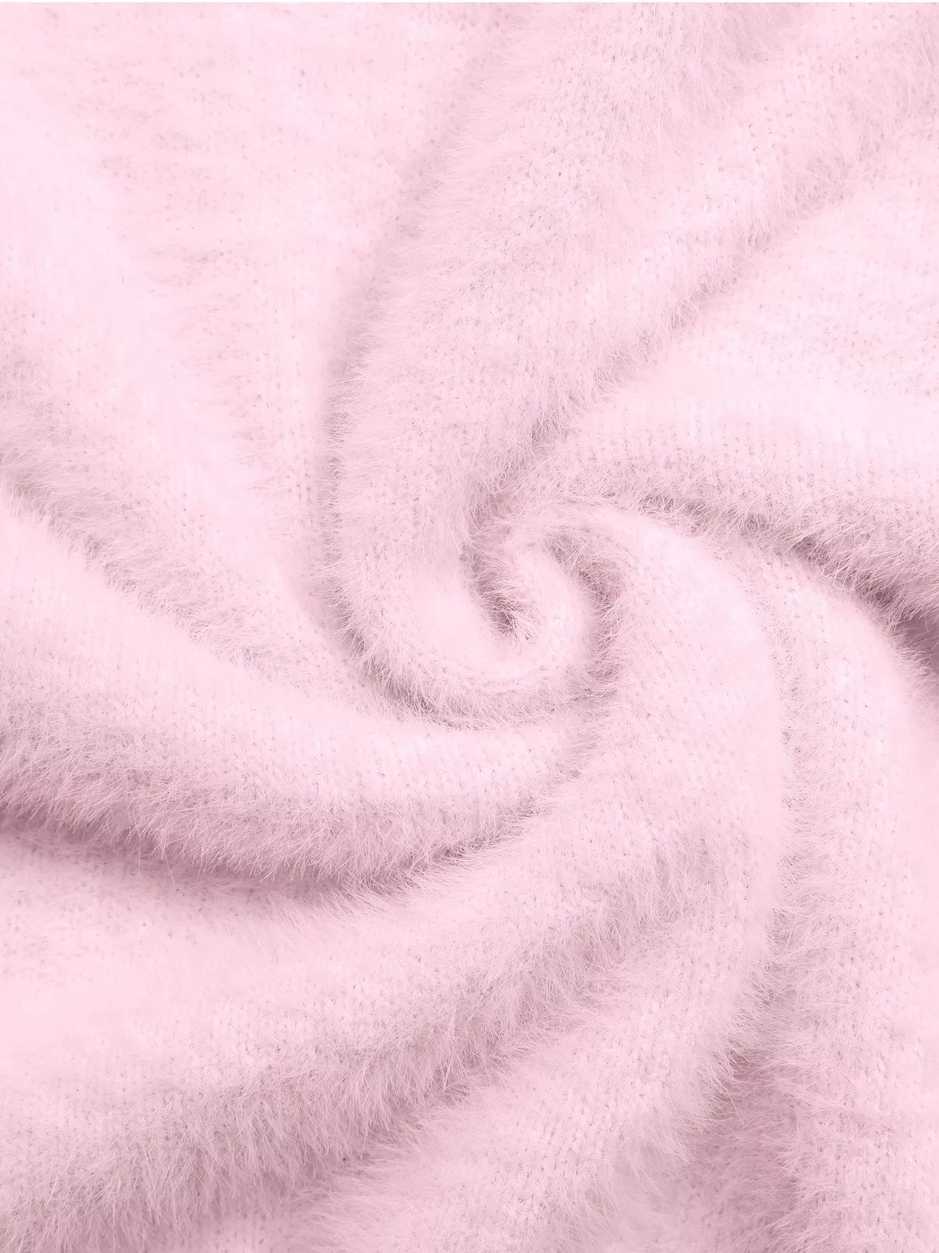 Pink fluffy long sleeve sweater from Trendsi, soft and cozy knit top with a relaxed fit and ribbed cuffs.