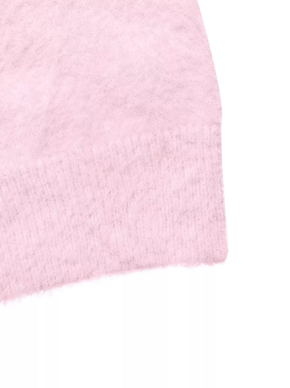 Pink fluffy long sleeve sweater from Trendsi with a cozy, soft knit and relaxed fit, perfect for casual wear.