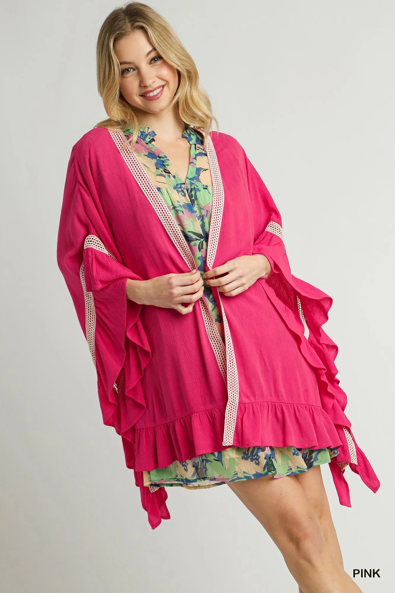 Pink Umgee ruffle trim kimono by Trendsi featuring crochet accents, lightweight and flowy with a relaxed fit.