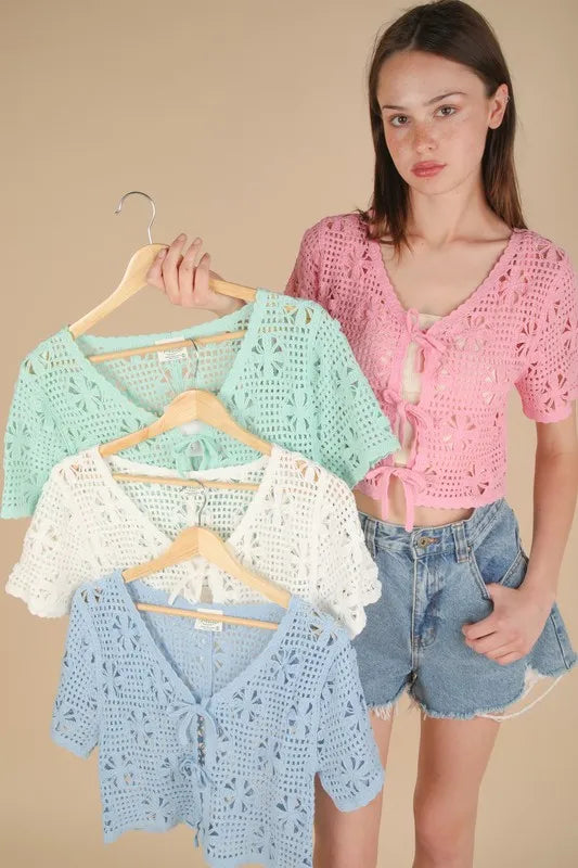 Pink Very J crochet crop top with front tie detail, short sleeves, and a stylish, breathable knit design.