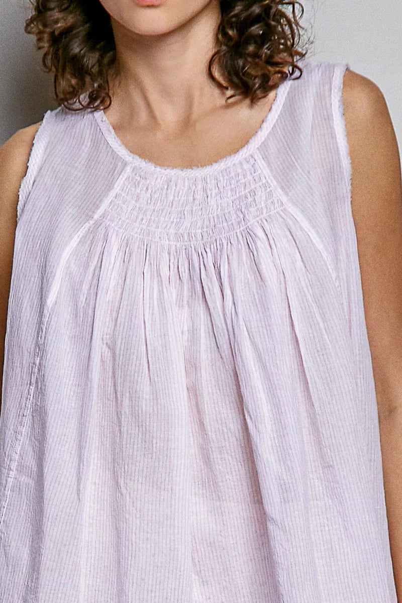 Pink striped sleeveless cotton top with a round neck and pleated design from Trendsi, perfect for casual summer wear.