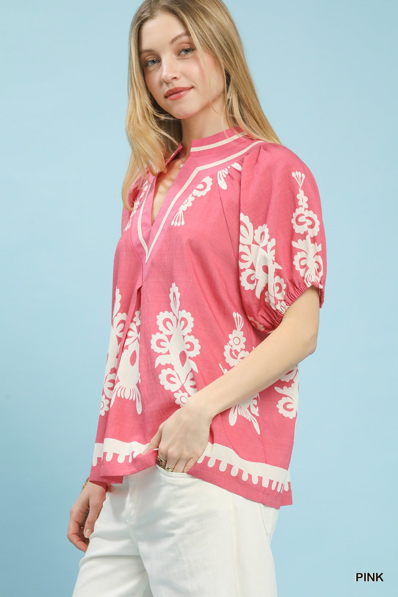 Pink Umgee boho print split-neck short sleeve top, casual women's fashion with relaxed fit and stylish design.