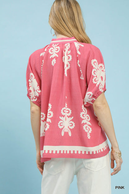 Pink Umgee boho print short sleeve top with split neckline, featuring a relaxed fit and bohemian style.