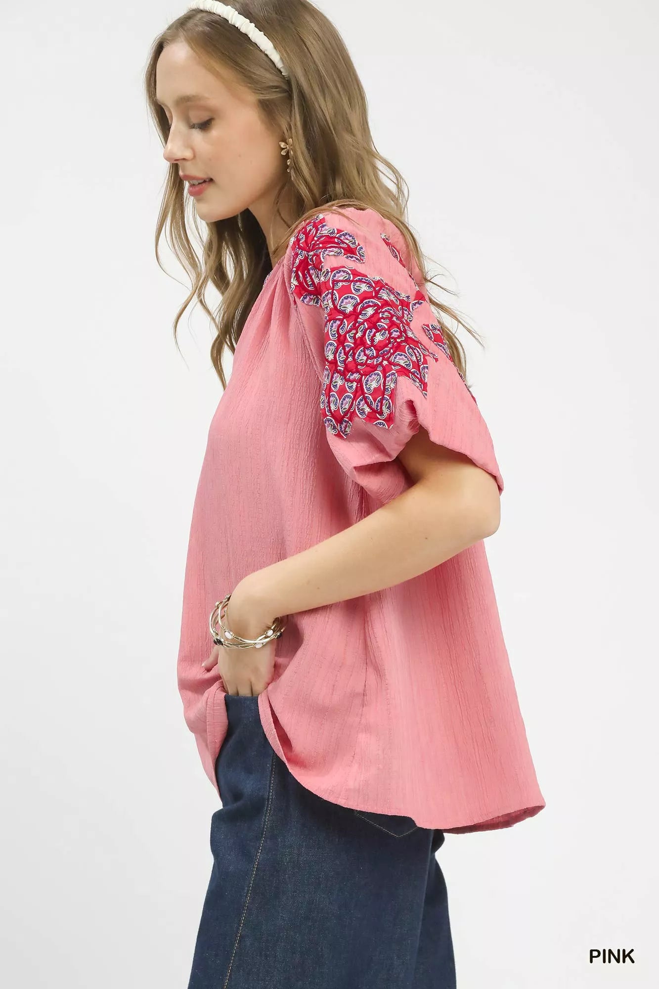 Pink Umgee embroidered sleeve contrast trim top with detailed embroidery and stylish design, perfect for casual or chic outfits.