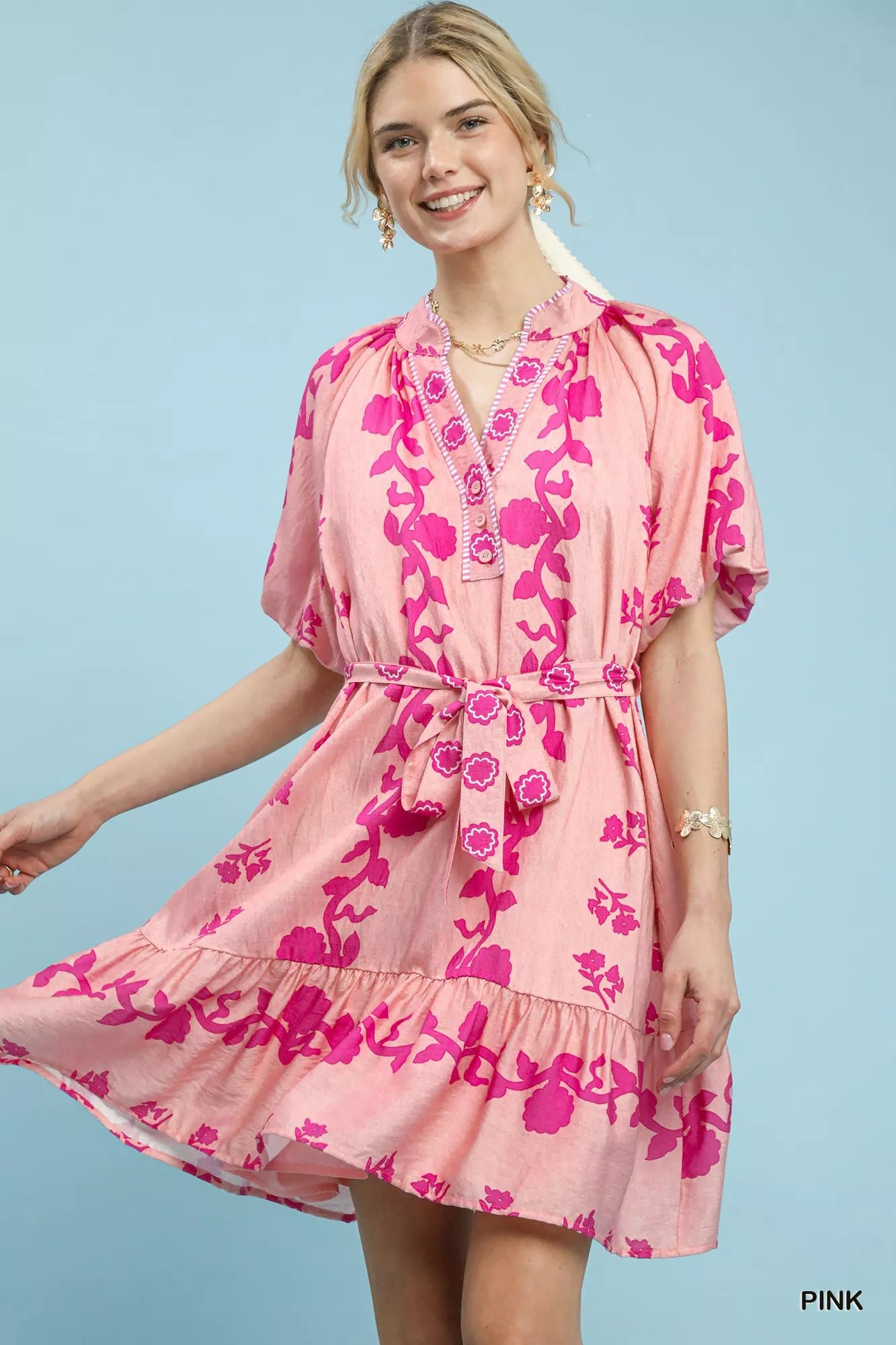 Pink Umgee floral tie-waist boho mini dress with a relaxed fit and ruffled hem, perfect for casual summer outfits.