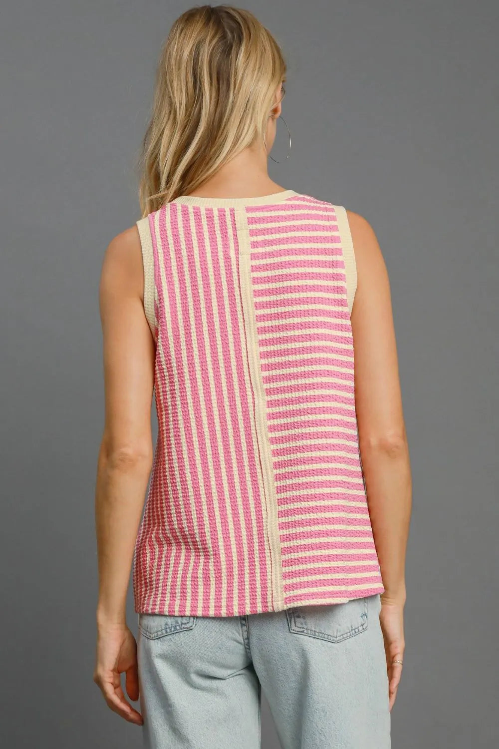 Pink Umgee round neck tank top with textured striped pattern, casual sleeveless design, perfect for everyday wear.