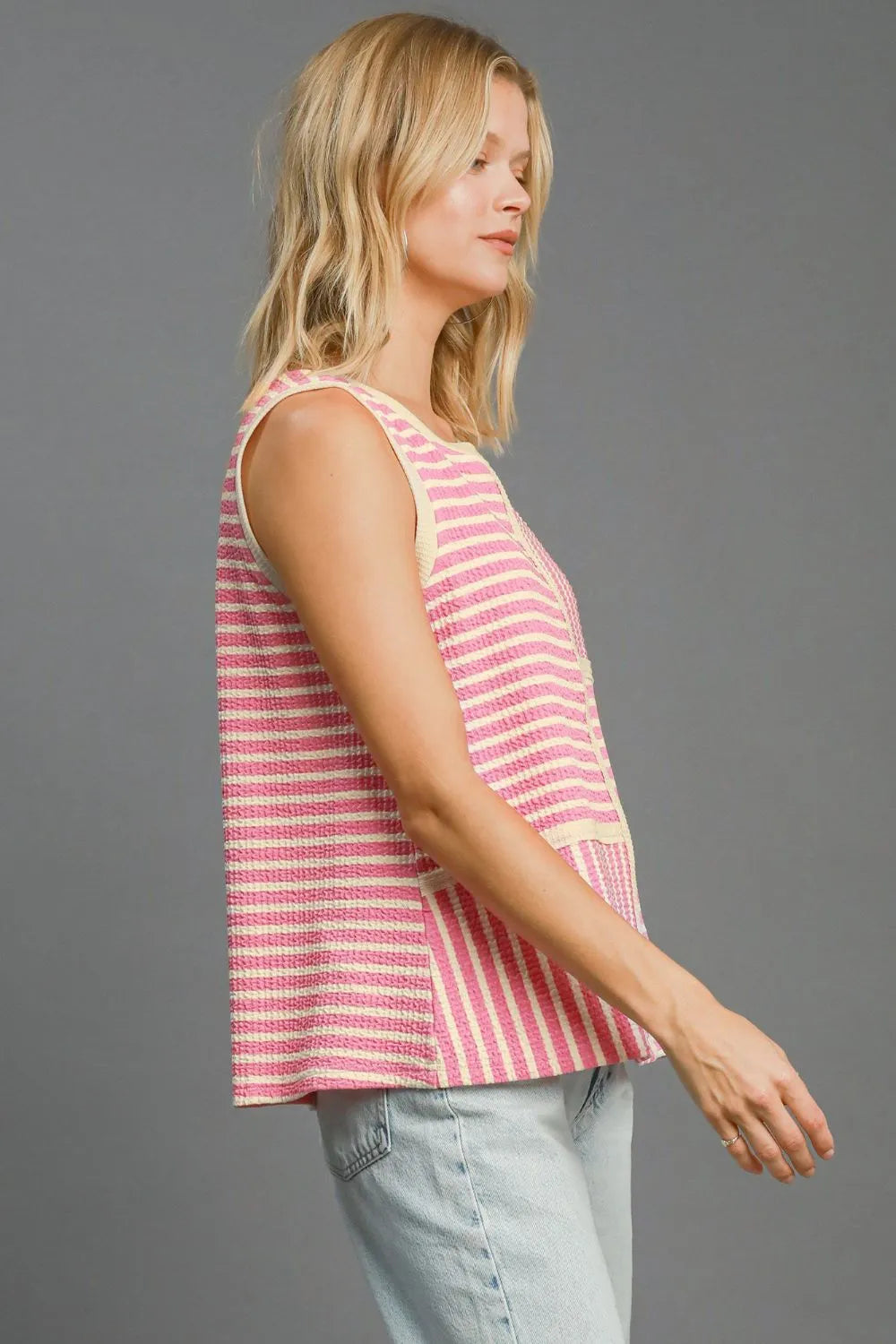 Pink Umgee striped tank top with a round neck and textured fabric, shown on a neutral background.
