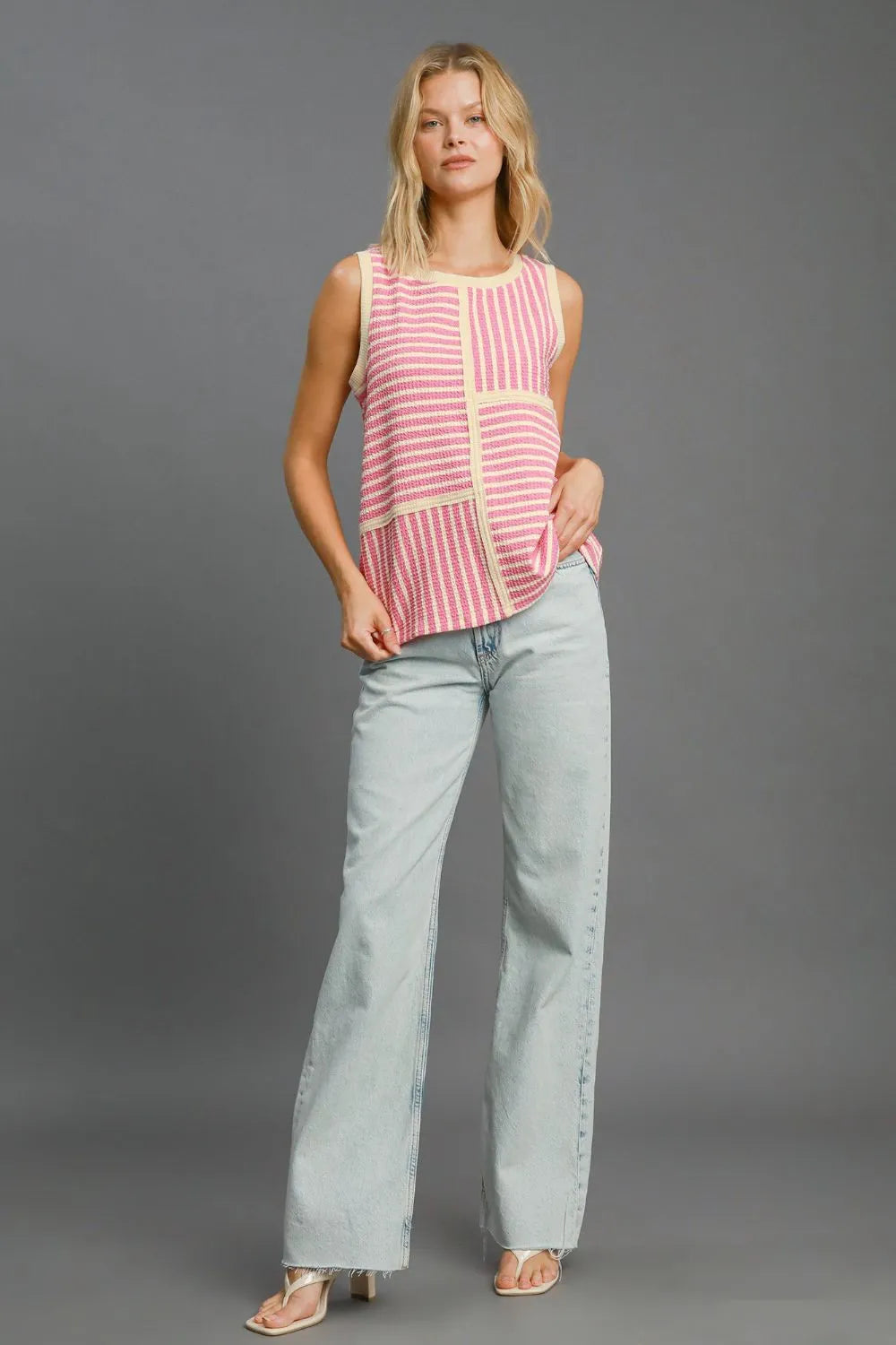 Pink Umgee round neck striped tank top with textured fabric, casual sleeveless design, featuring horizontal stripe pattern.