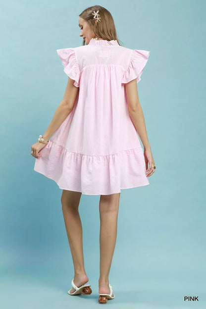 Pink Umgee Stripe Smocked Yoke Ruffle Dress featuring a fitted yoke and flowy ruffle details, perfect for casual or dressy occasions.