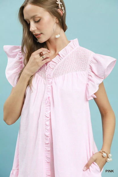 Pink Umgee stripe smocked yoke ruffle dress with short sleeves and flowy silhouette, featuring a feminine, boho-inspired design.