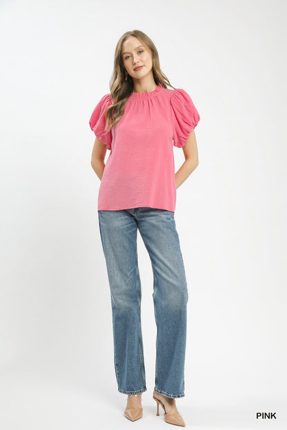 Pink Umgee textured gauze boho top with ruffle neckline, casual and stylish fashion piece by Trendsi.