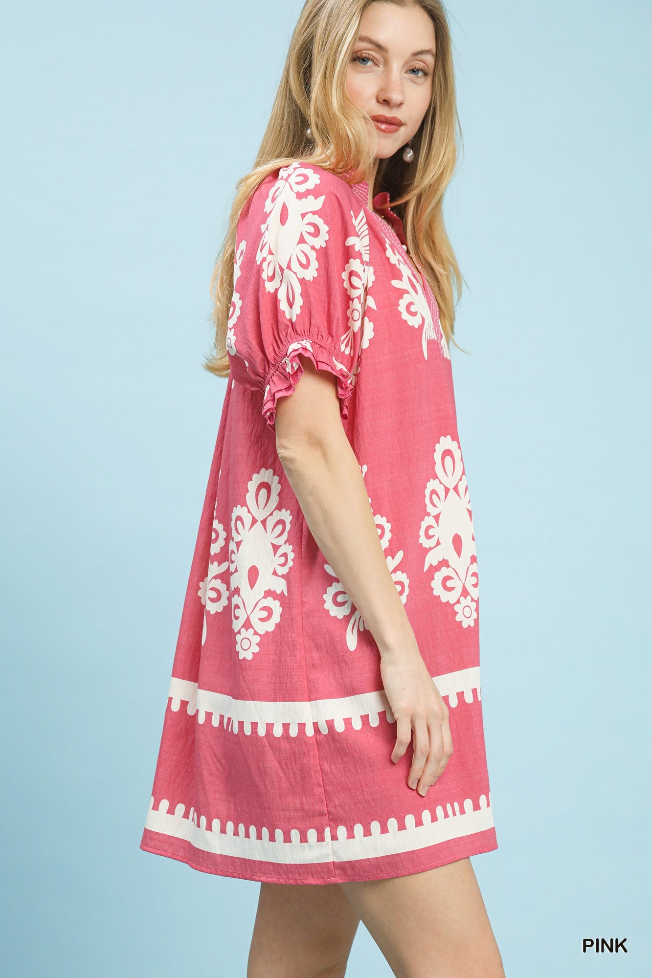 Pink Umgee two-tone border print mini dress with short sleeves and relaxed fit, perfect for casual summer wear.