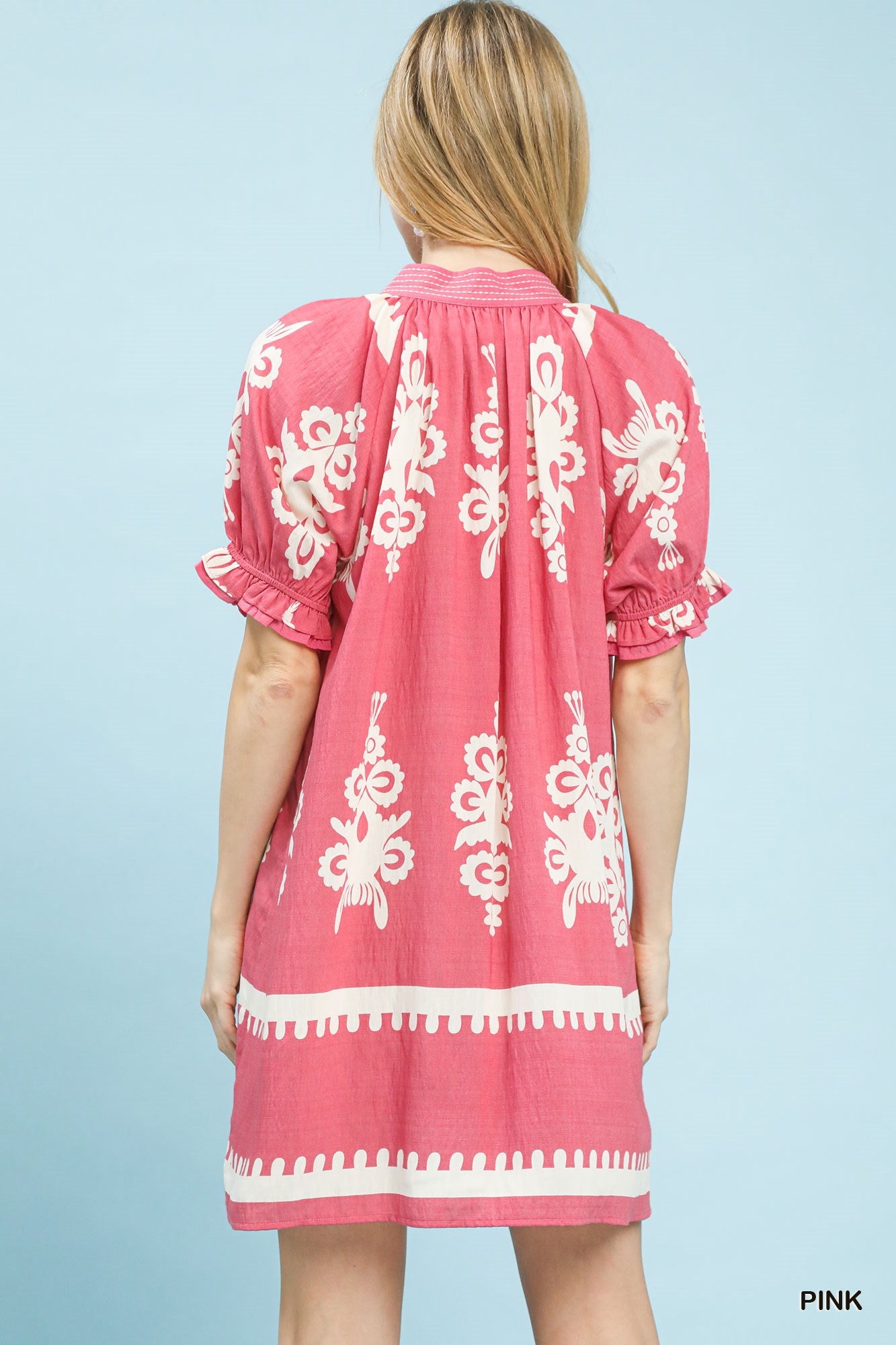 Pink Umgee Two Tone Border Print Mini Dress with short sleeves and a flattering fit, perfect for casual or summer wear.