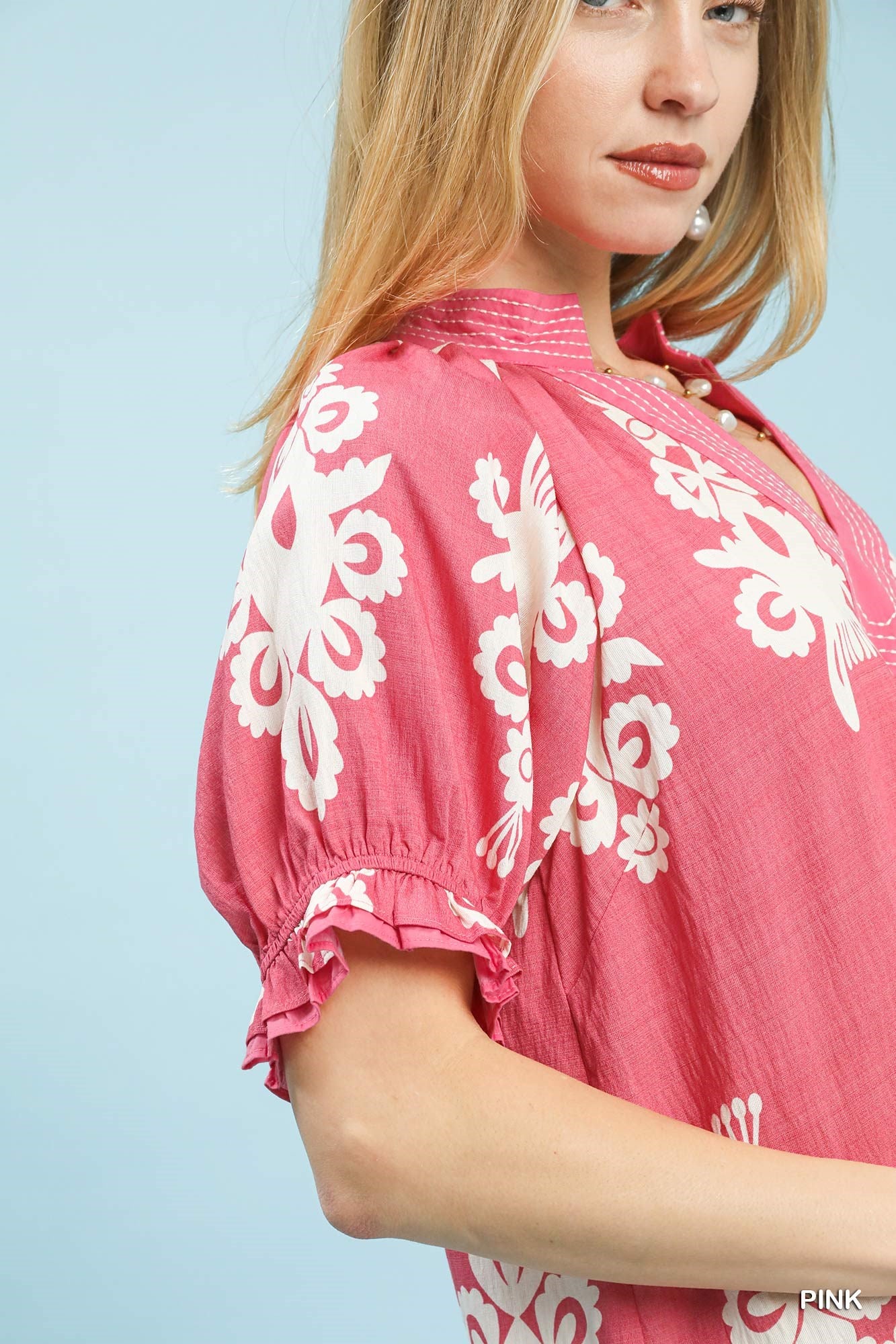 Pink Umgee two-tone border print mini dress with short sleeves and relaxed fit, perfect for casual wear.