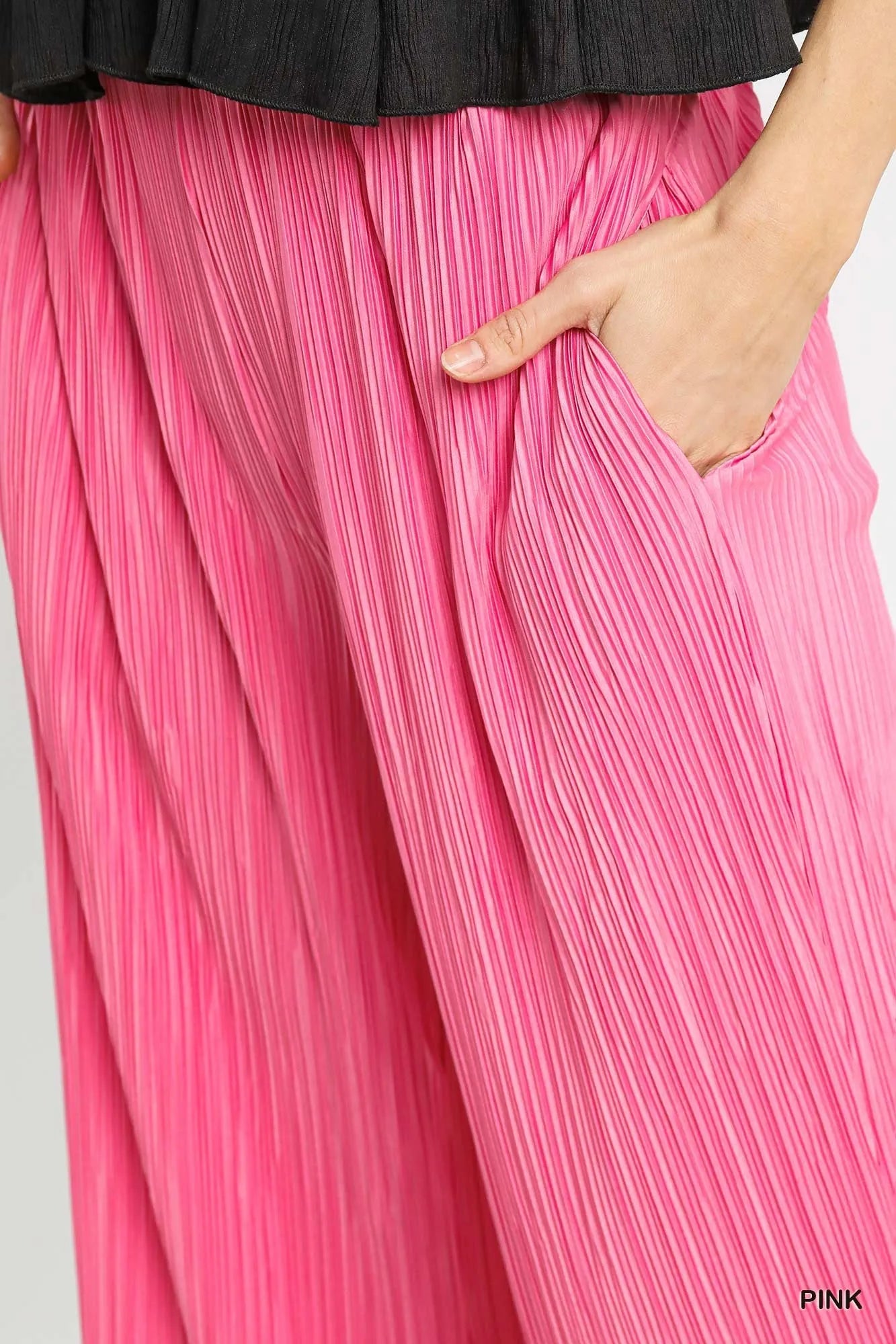 Pink Umgee wide-leg textured pants from Trendsi, featuring a relaxed fit and stylish fabric details.