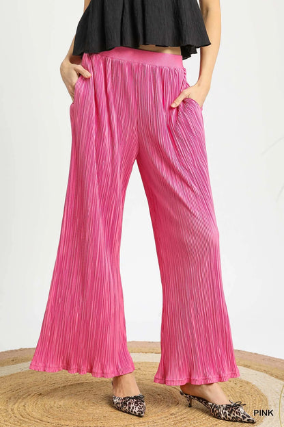 Pink Umgee wide leg textured pants by Trendsi, featuring a flowy fit and stylish design, shown on a model.