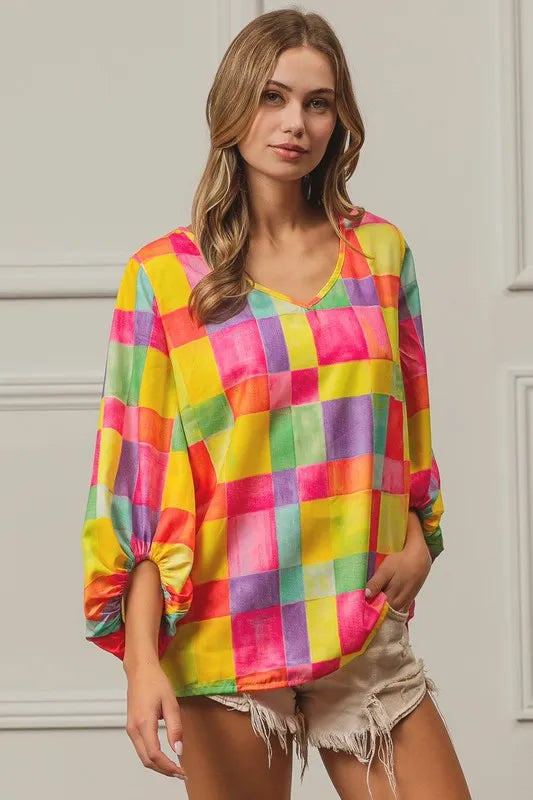 Pink, yellow, and blue BiBi Multi Block Bubble Pop Balloon Top by Trendsi with vibrant, playful bubble design and colorful block pattern.