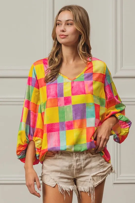 Trendsi BiBi Multi Block Bubble Pop Balloon Top in pink, yellow, and blue, featuring a colorful, playful design with bubble accents.