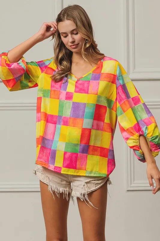 Pink, yellow, and blue BiBi Multi Block Bubble Pop Balloon Top by Trendsi, featuring colorful, playful bubble design.