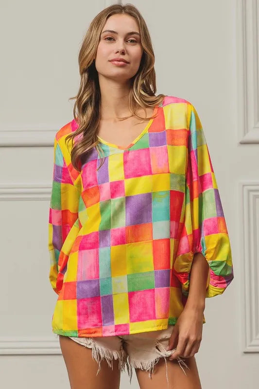Pink, yellow, and blue BiBi Multi Block Bubble Pop Balloon Top by Trendsi, featuring colorful bubble pop design and stylish fit.