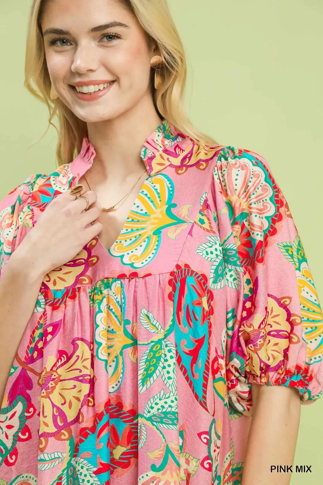 Pink paisley print mini dress by Umgee featuring a stylish, feminine design and lightweight fabric, perfect for casual wear.