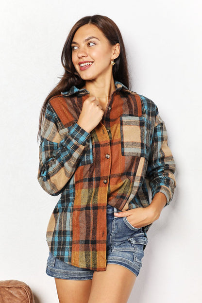 Trendsi Double Take plaid shirt jacket with curved hem and breast pockets, stylish casual outerwear for women.