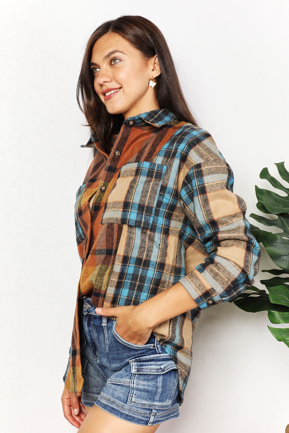 Trendsi Double Take plaid shirt jacket with curved hem, breast pockets, long sleeves, and button closure.