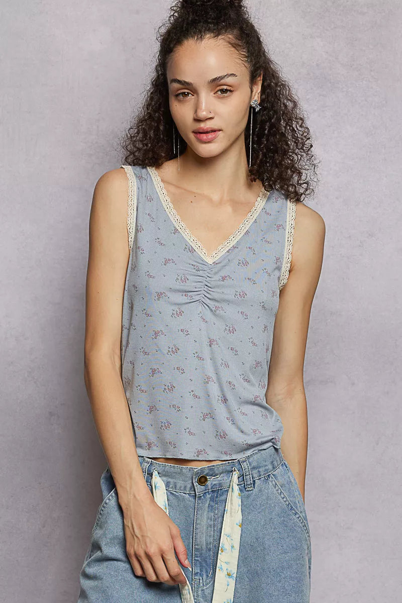 Powder blue POL floral V-neck tank top with ruched fabric and lace detail, stylish and lightweight for casual wear.
