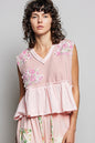 Powder pink sleeveless top with floral patch, ruffled details, and raw edge trim, by Trendsi.