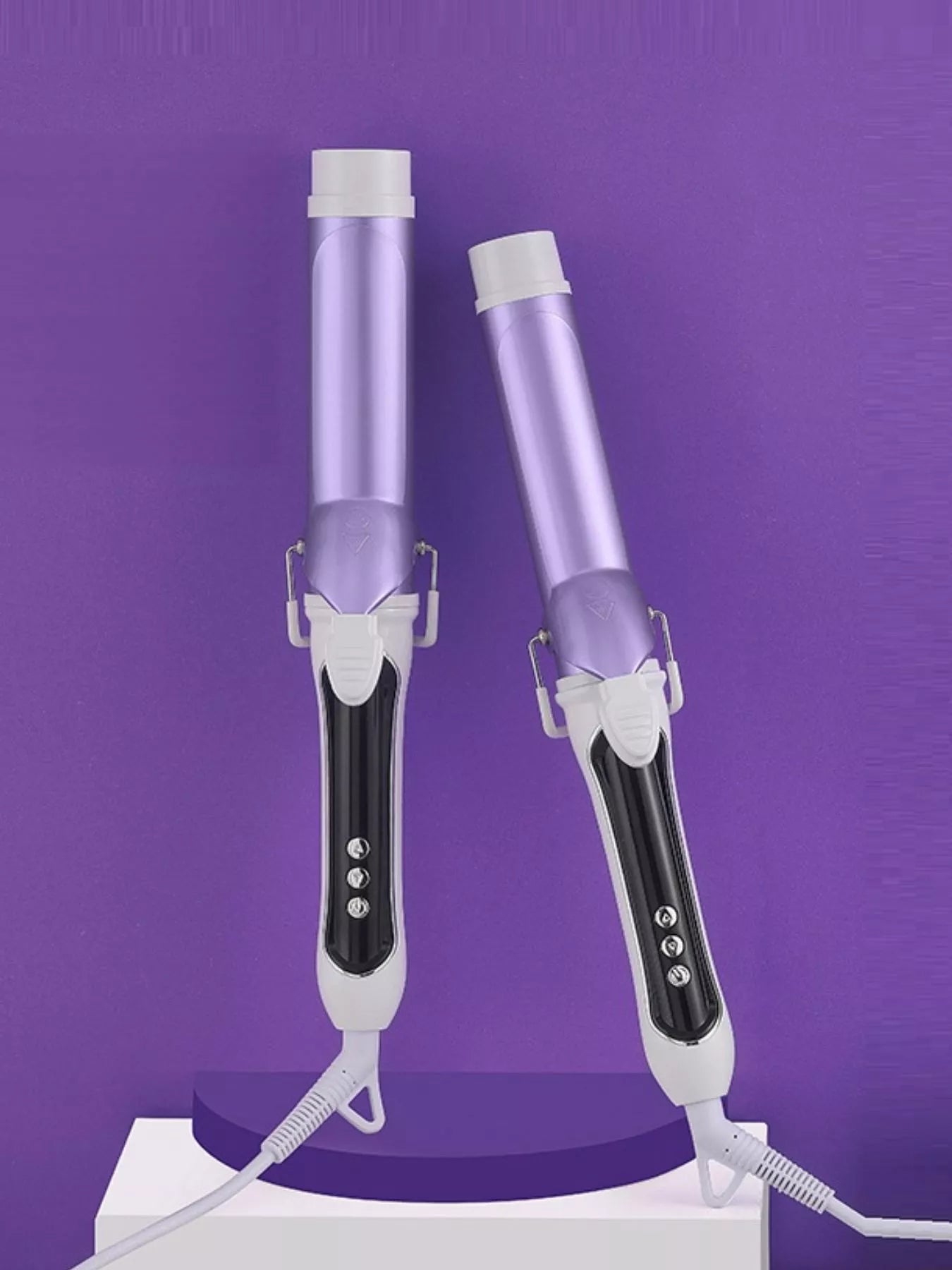 Purple automatic rotating ceramic curling iron with European plug from Trendsi, designed for creating smooth, curled hairstyles.