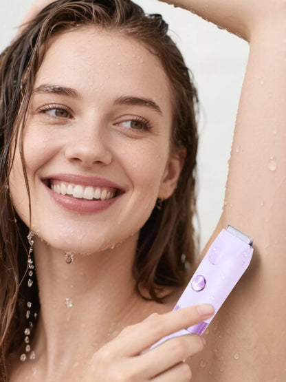 Purple 2-in-1 painless electric hair removal device by Trendsi, showing the compact handheld design and attachments.