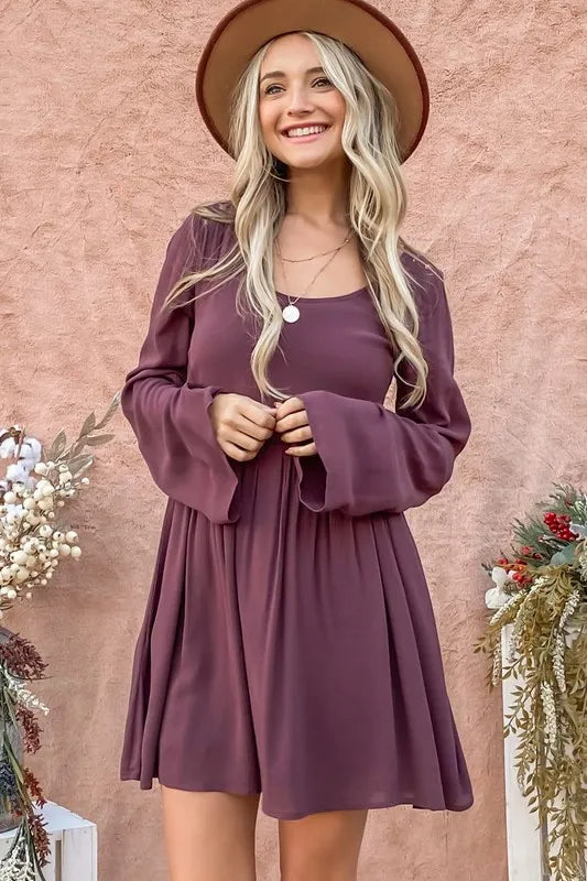 Purple bell sleeve dress with lace back detail and button-down front from Trendsi, styled with a casual yet elegant look.