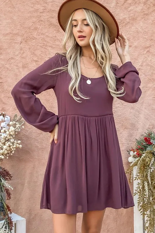 Purple bell sleeve dress by Trendsi featuring lace back and button-down front, stylish and elegant for casual or dressy occasions.