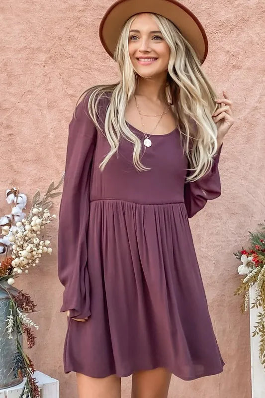 Purple bell sleeve dress with lace back and button-down detail by Trendsi, featuring a stylish and elegant design.