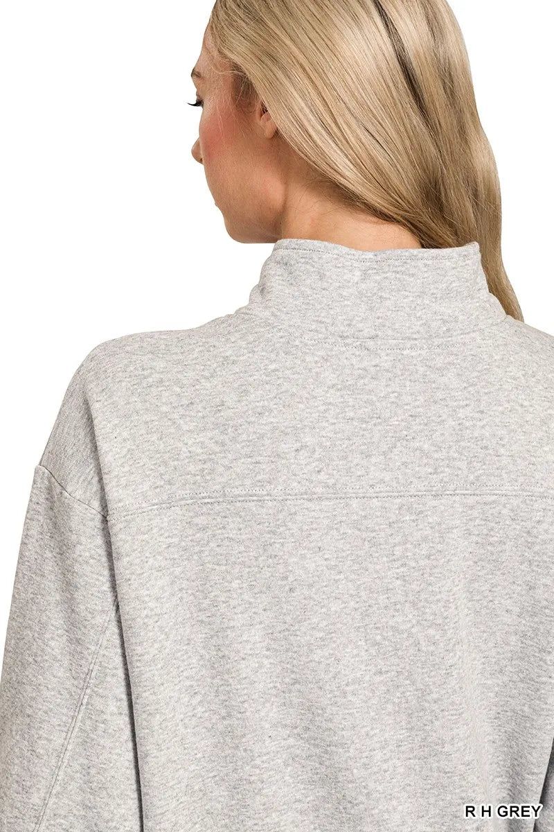 Grey Zenana fleece half-zip sweatshirt with stand collar and relaxed fit, displayed on a hanger.