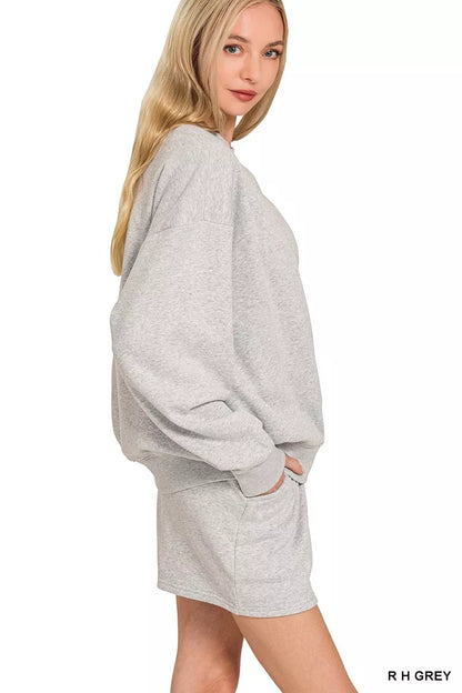 Grey Zenana fleece long sleeve sweatshirt and shorts set from Trendsi, cozy loungewear for casual comfort.
