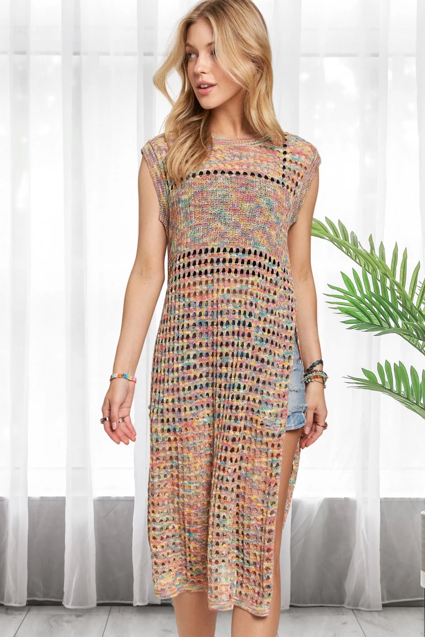 Multi-color crochet tunic top by Trendsi featuring vibrant rainbow hues and a relaxed fit, perfect for casual summer wear.