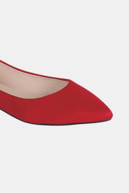 Red Forever Link pointy toe slip-on flat loafers by Trendsi, featuring a sleek design and comfortable flat sole.