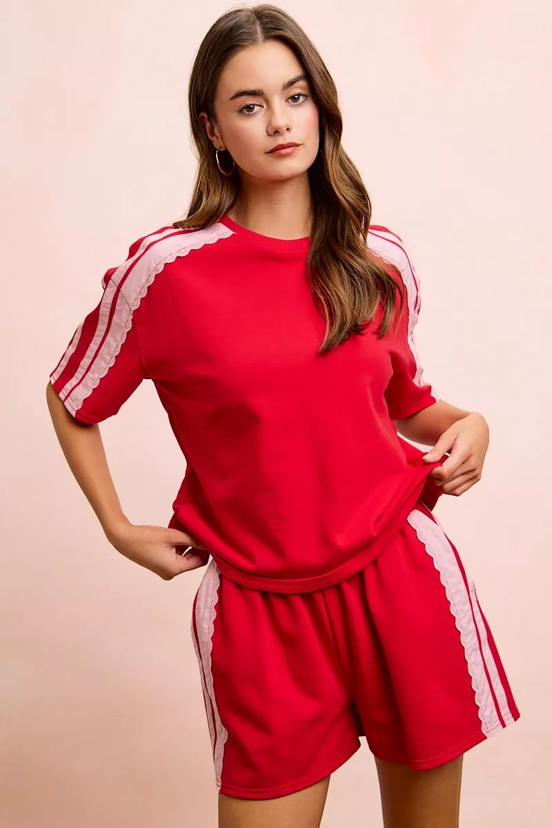 Red blush BiBi French Terry short sleeves top with side lace detail from Trendsi, casual and stylish for everyday wear.